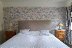 'Das gerumige und gemtliche Schlafzimmer ist mit einem Premium SUPERBABoxspringbett (160x200 cm) aus der Schweiz ausgestattet und erfllt alle Ansprche fr einen erholsamen Schlaf.'
