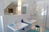 'Das Bad im OG mit walk in Dusche ist farblich ansprechend gestaltet und zeigt ein modernes ansprechendes Ambiente.'