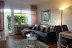 'Das Wohnzimmer, mit gemtlicher Couch in modernen Farben...'